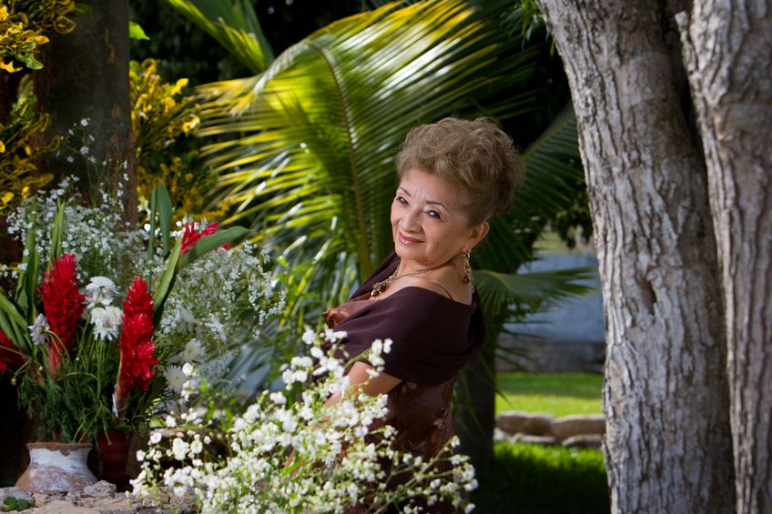 9657658 - old latin lady dances in a garden
